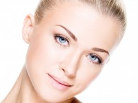 Portrait of beautiful young blond woman with clean face